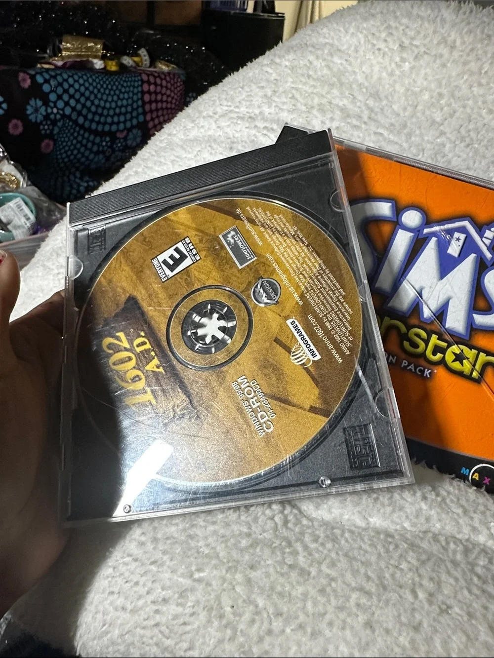 The Sims: Superstar Expansion Pack & 1602 A.D. -used scratches on case